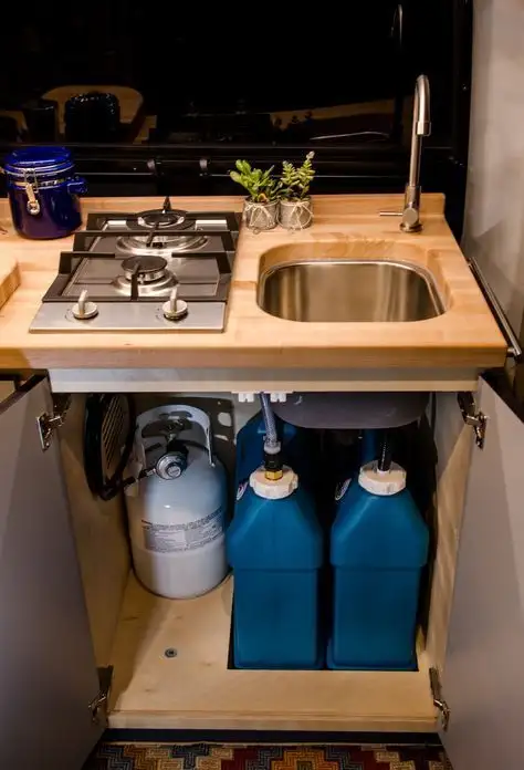 Stand Fresh Water Jugs Upright Beside the Propane Tank