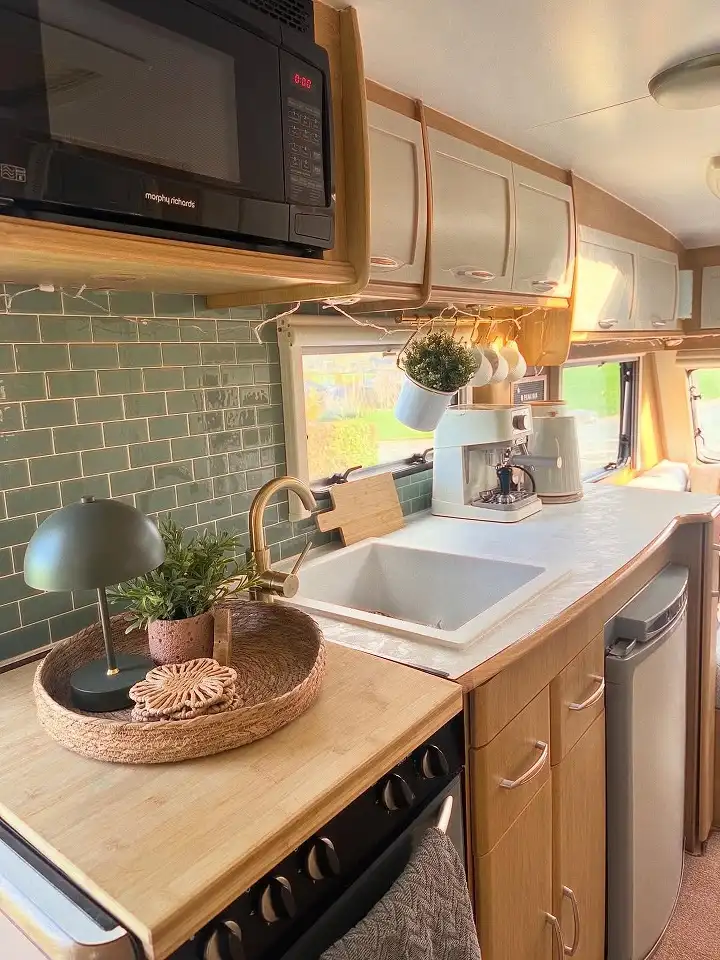 Hang Mugs From a Rod Instead of Stacking Them in a Cabinet