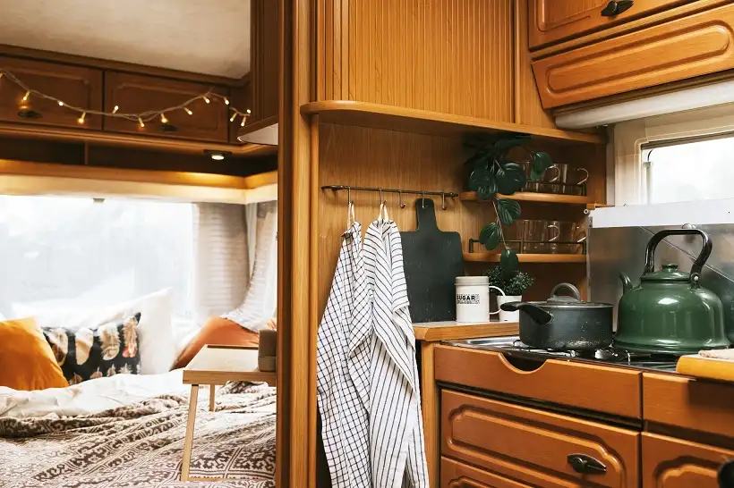 Hang Aprons and Towels From Hooks So They're Never Balled Up in a Drawer